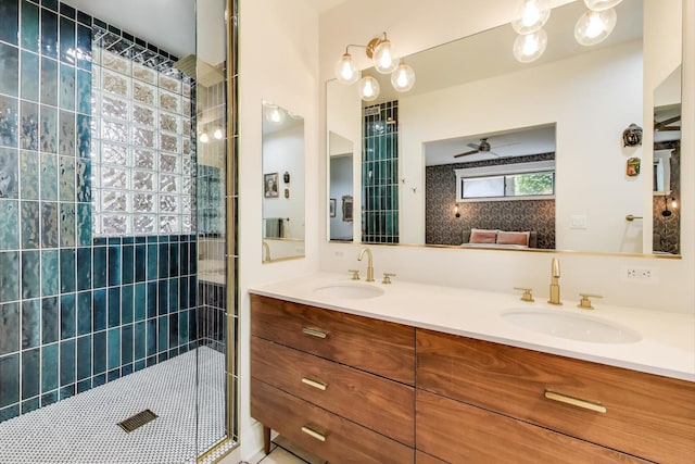 4611 N Magnolia Ave Unit 2, Chicago, IL 60640 - bathroom with double vanity, tiled shower, and a ceiling fan