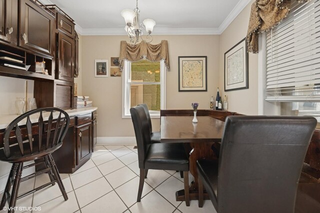 3432 S Union Ave, Chicago, IL 60616 - dining space featuring crown molding, a chandelier, and light tile patterned floors