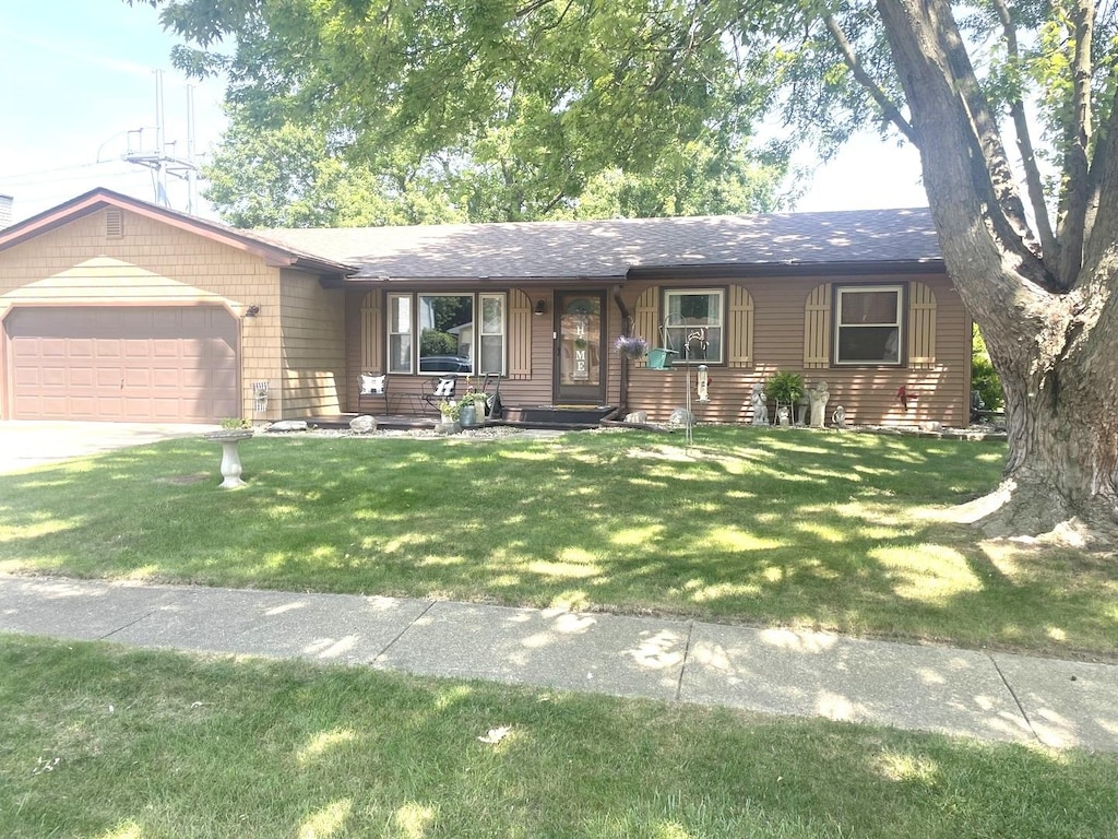 808 Heather Dr, Bourbonnais, IL 60914 - ranch-style house featuring a garage, a front yard, and concrete driveway