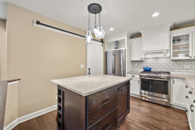 10750 Cape Cod Ln, Huntley, IL 60142 - kitchen with stainless steel appliances, a barn door, open shelves, white cabinets, and recessed lighting