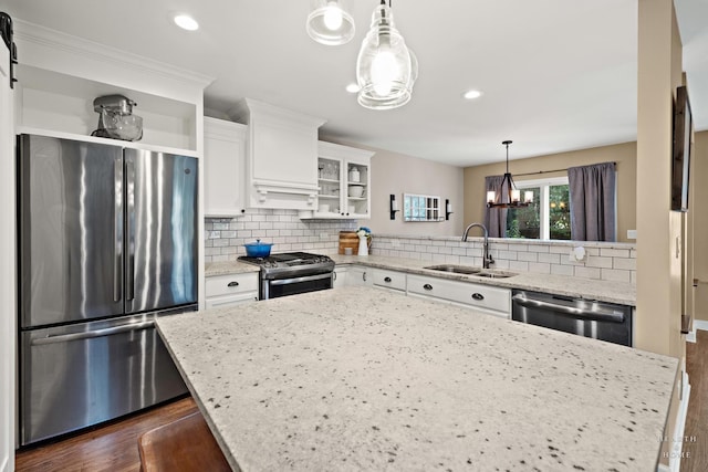 10750 Cape Cod Ln, Huntley, IL 60142 - kitchen featuring stainless steel appliances, a chandelier, dark wood-style flooring, decorative backsplash, and open shelves