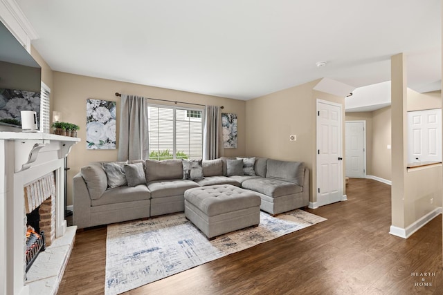 10750 Cape Cod Ln, Huntley, IL 60142 - living area featuring wood finished floors and a brick fireplace