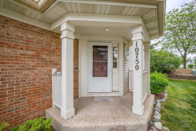 10750 Cape Cod Ln, Huntley, IL 60142 - view of exterior entry featuring brick siding
