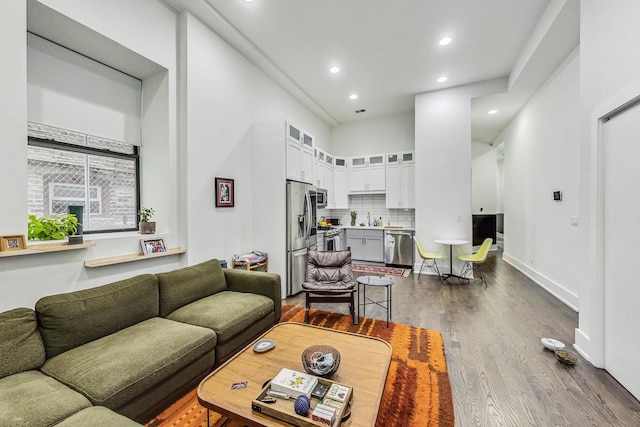 1847 N Kedzie Ave Unit 1N, Chicago, IL 60647 - living area with dark wood-style floors and recessed lighting