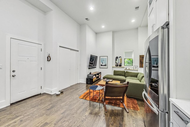 1847 N Kedzie Ave Unit 1N, Chicago, IL 60647 - living area with wood finished floors, a high ceiling, and recessed lighting
