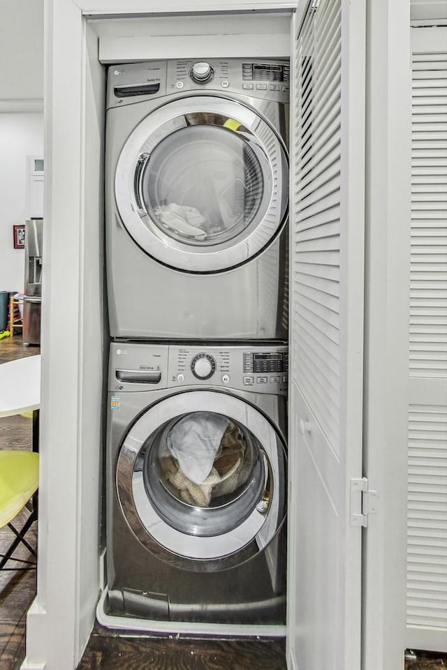 1847 N Kedzie Ave Unit 1N, Chicago, IL 60647 - laundry room featuring stacked washer / dryer