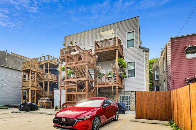 1847 N Kedzie Ave Unit 1N, Chicago, IL 60647 - view of front facade with uncovered parking and brick siding
