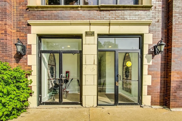 1847 N Kedzie Ave Unit 1N, Chicago, IL 60647 - doorway to property featuring brick siding