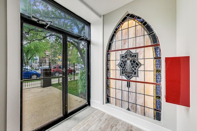1847 N Kedzie Ave Unit 1N, Chicago, IL 60647 - doorway featuring wood finished floors and baseboards