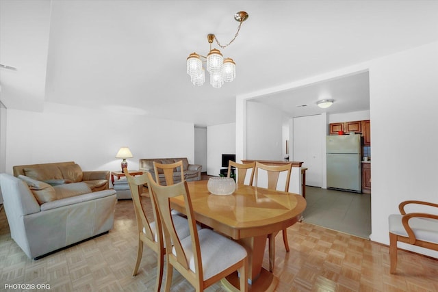 4838 Howard St Unit 301, Skokie, IL 60077 - dining space with a chandelier