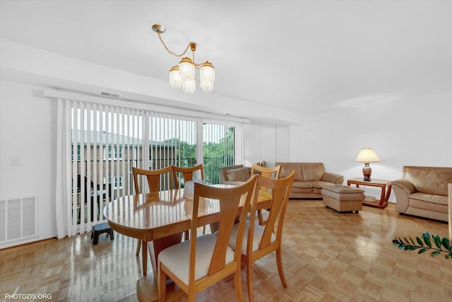 4838 Howard St Unit 301, Skokie, IL 60077 - dining room with a chandelier