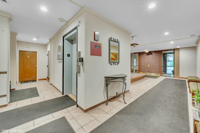 4838 Howard St Unit 301, Skokie, IL 60077 - hall featuring light tile patterned floors and recessed lighting