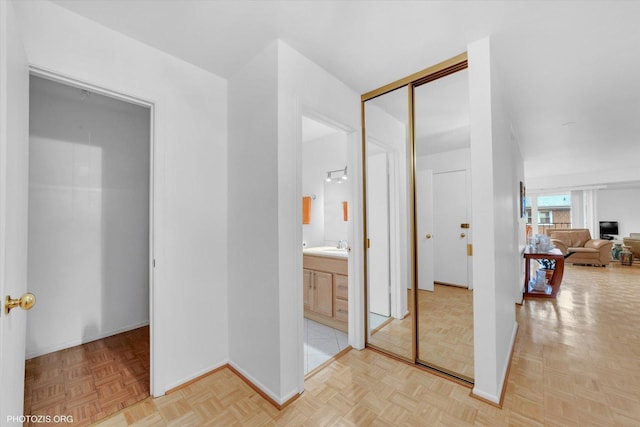 4838 Howard St Unit 301, Skokie, IL 60077 - corridor with a sink and baseboards