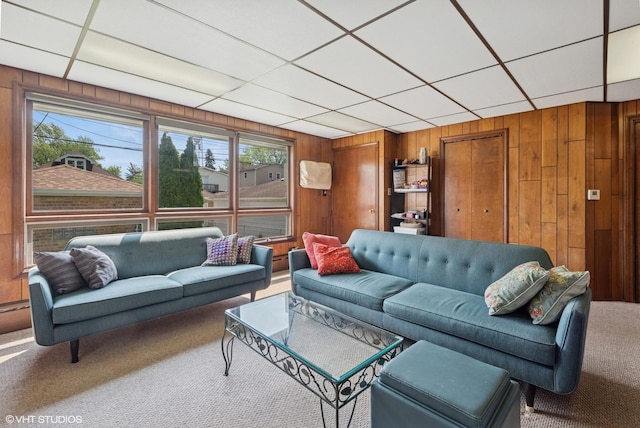 6321 N Merrimac Ave, Chicago, IL 60646 - carpeted living room featuring wooden walls and a paneled ceiling