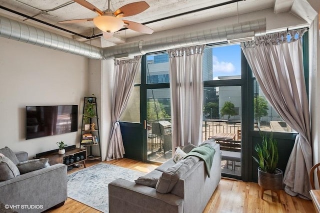 221 E Cullerton St Unit 314, Chicago, IL 60616 - living room with a ceiling fan and wood finished floors