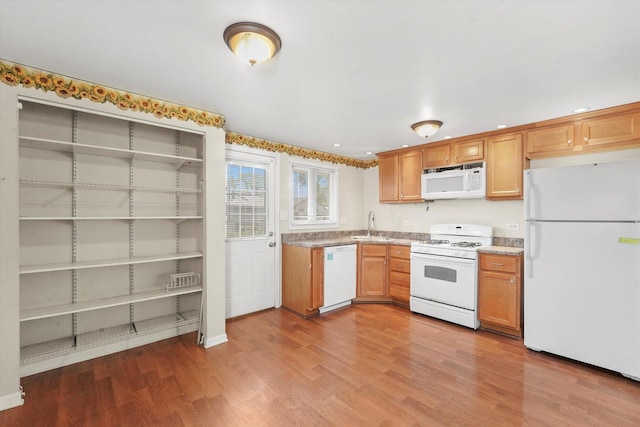 4153 W 89th Pl None, Unit None, Hometown, IL 60456 - kitchen featuring white appliances, wood finished floors, recessed lighting, and brown cabinetry