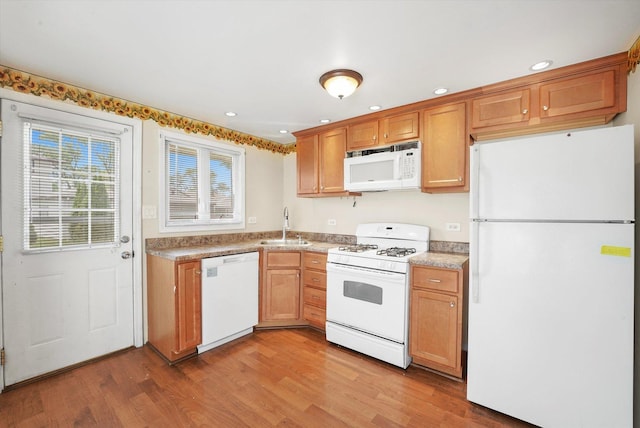 4153 W 89th Pl None, Unit None, Hometown, IL 60456 - kitchen featuring white appliances, light wood-style flooring, light countertops, recessed lighting, and brown cabinets