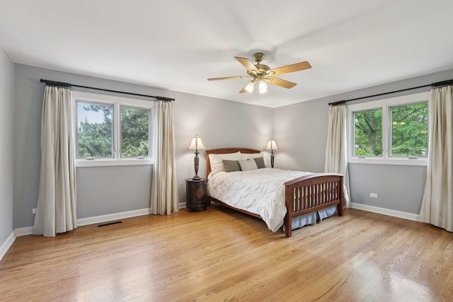 102 E Adelia St, Elmhurst, IL 60126 - bedroom with light wood finished floors and ceiling fan