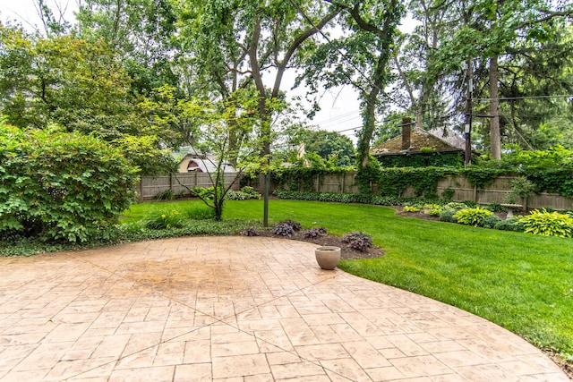 2458 E Cass St, Joliet, IL 60432 - fenced backyard featuring a patio area
