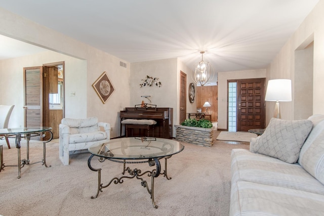 2458 E Cass St, Joliet, IL 60432 - living room with carpet flooring, a chandelier, and healthy amount of natural light