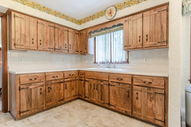 2458 E Cass St, Joliet, IL 60432 - kitchen featuring light countertops and tasteful backsplash