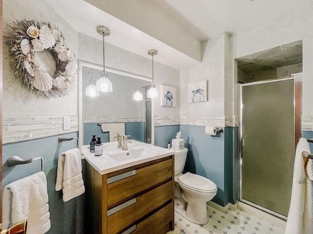 2458 E Cass St, Joliet, IL 60432 - bathroom featuring vanity, a shower stall, and tile patterned floors