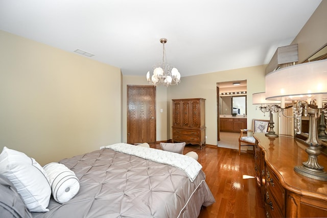 678 Larch Dr, Carol Stream, IL 60188 - bedroom featuring a chandelier, wood finished floors, and connected bathroom