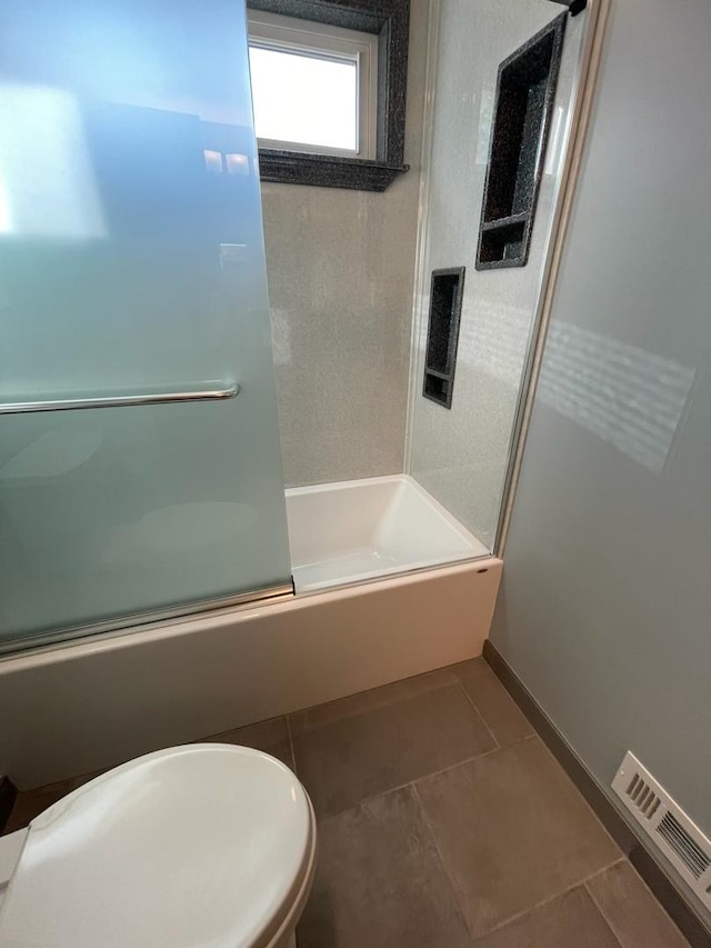 678 Larch Dr, Carol Stream, IL 60188 - bathroom featuring tile patterned flooring and shower / bath combination with glass door