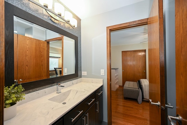 678 Larch Dr, Carol Stream, IL 60188 - bathroom featuring vanity and wood finished floors