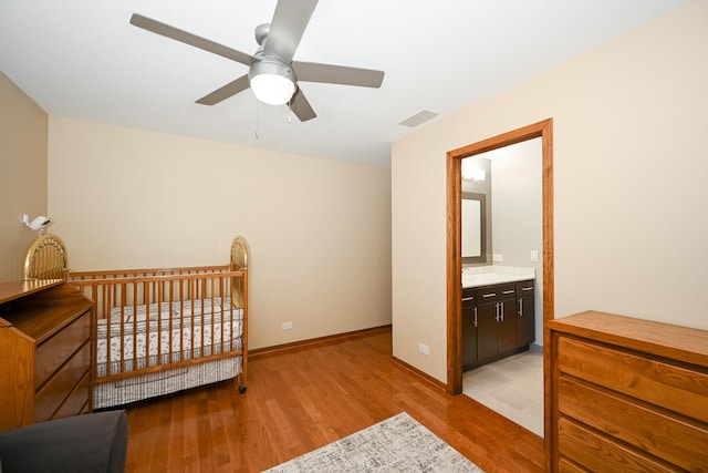 678 Larch Dr, Carol Stream, IL 60188 - bedroom featuring light wood-style flooring and baseboards