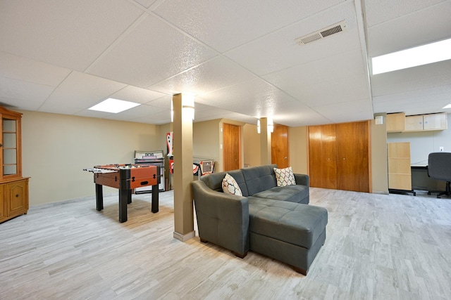 678 Larch Dr, Carol Stream, IL 60188 - living room featuring light wood finished floors and a drop ceiling