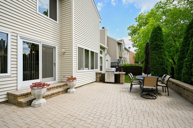 678 Larch Dr, Carol Stream, IL 60188 - view of patio featuring outdoor dining area and grilling area
