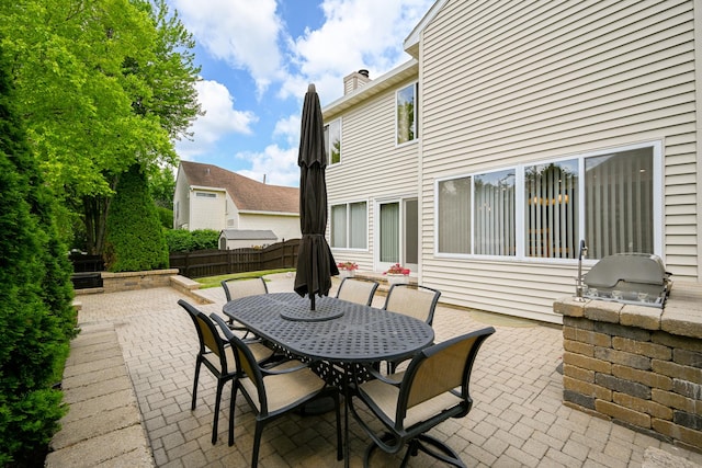 678 Larch Dr, Carol Stream, IL 60188 - view of patio featuring an outdoor kitchen and outdoor dining area