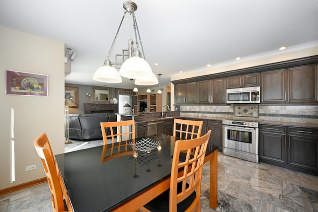 678 Larch Dr, Carol Stream, IL 60188 - dining area with light stone finish flooring and recessed lighting