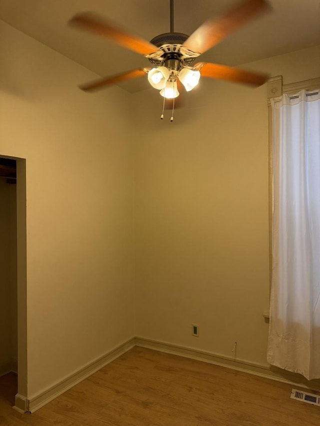 2735 W Washington Blvd, Chicago, IL 60612 - unfurnished room with wood finished floors and ceiling fan