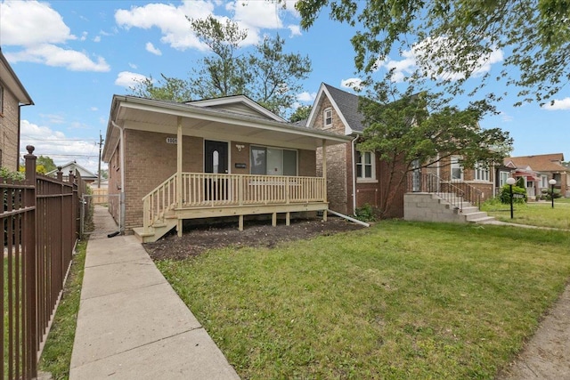 10011 S Princeton Ave, Chicago, IL 60628 - bungalow-style home featuring brick siding and a porch