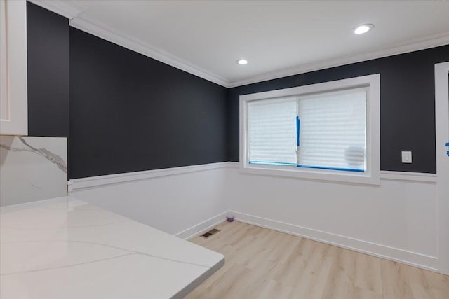 10011 S Princeton Ave, Chicago, IL 60628 - spare room with light wood-style flooring, crown molding, and recessed lighting