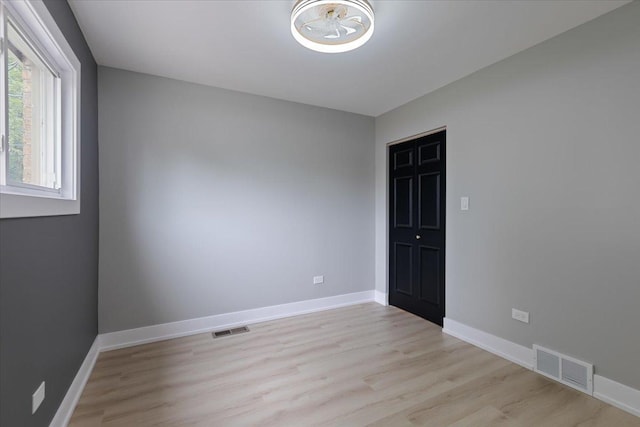 10011 S Princeton Ave, Chicago, IL 60628 - empty room with light wood-type flooring