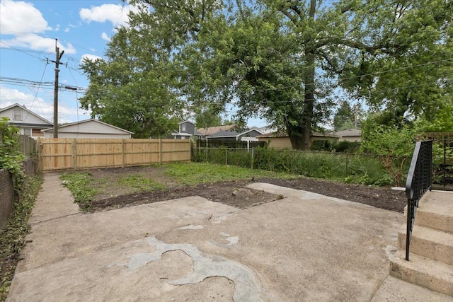 10011 S Princeton Ave, Chicago, IL 60628 - fenced backyard featuring a patio area