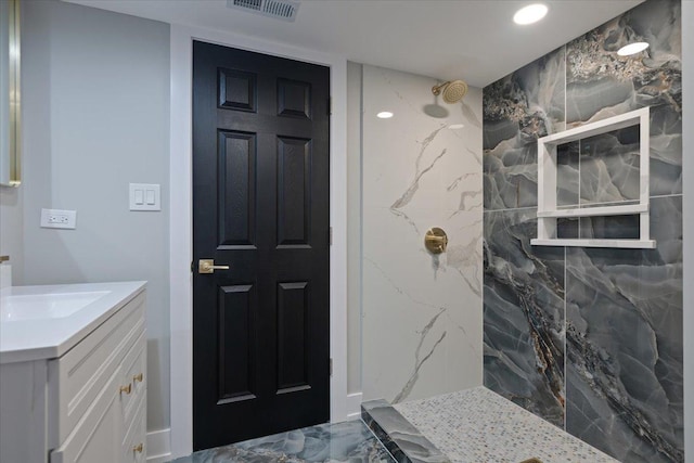 10011 S Princeton Ave, Chicago, IL 60628 - full bath featuring marble tiled floors, a marble finish shower, vanity, and recessed lighting