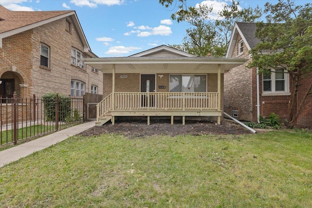 10011 S Princeton Ave, Chicago, IL 60628 - view of front of home with covered porch and brick siding