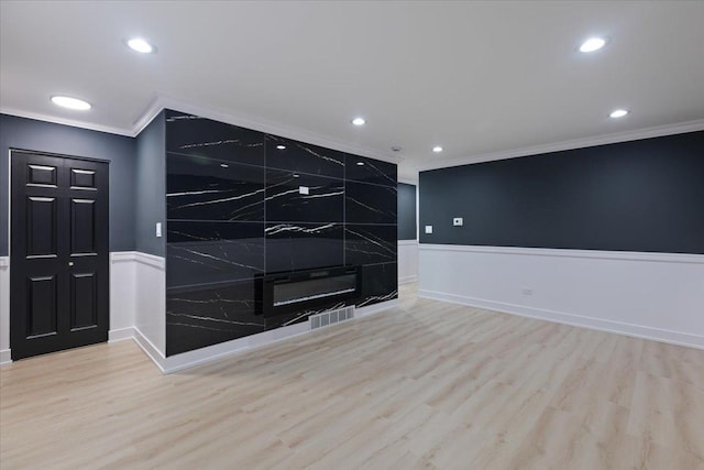 10011 S Princeton Ave, Chicago, IL 60628 - empty room with crown molding, light wood finished floors, and recessed lighting