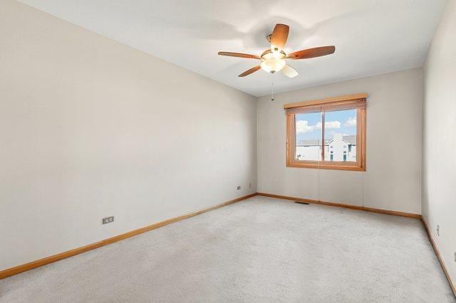3800 River Rd, Hazel Crest, IL 60429 - unfurnished room featuring a ceiling fan and light carpet