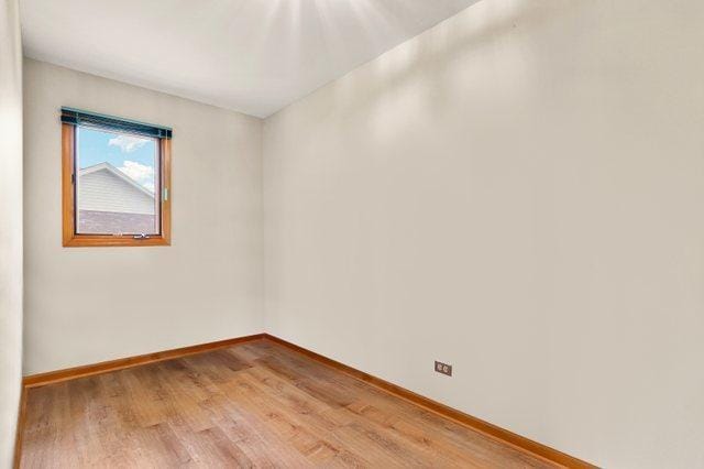 3800 River Rd, Hazel Crest, IL 60429 - unfurnished room featuring light wood-style flooring and baseboards