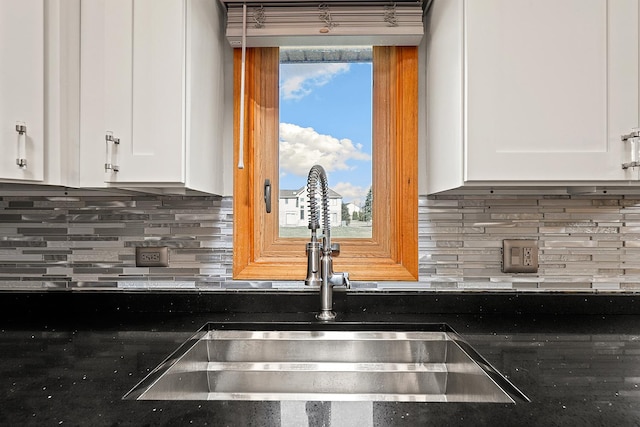 3800 River Rd, Hazel Crest, IL 60429 - kitchen view of white cabinets, tasteful backsplash, and dark stone counters