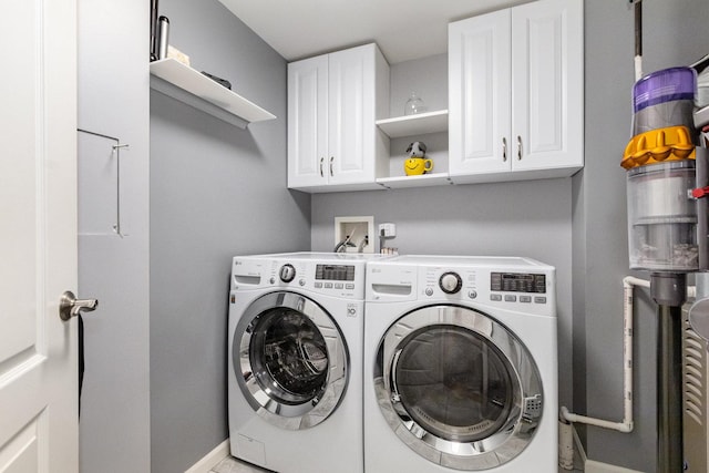 845 E 22nd St Unit 219, Lombard, IL 60148 - washroom with cabinet space and washer and clothes dryer