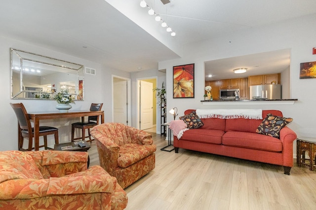 845 E 22nd St Unit 219, Lombard, IL 60148 - living room featuring light wood-style flooring
