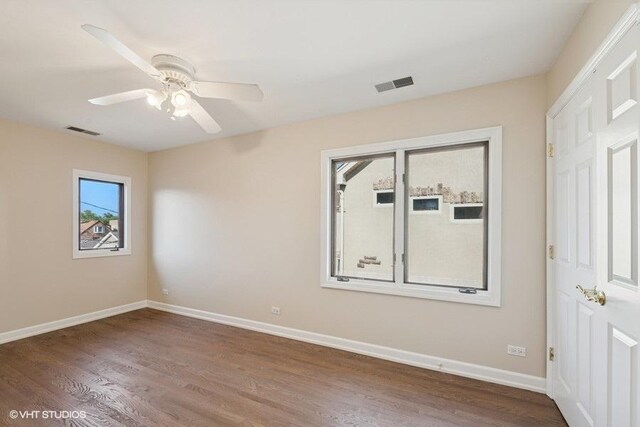 108 Yost Ave, Park Ridge, IL 60068 - unfurnished bedroom with dark wood-style floors and ceiling fan