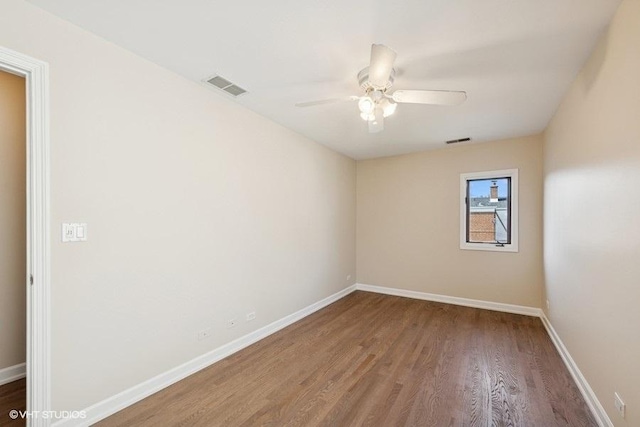 108 Yost Ave, Park Ridge, IL 60068 - spare room with wood finished floors and ceiling fan