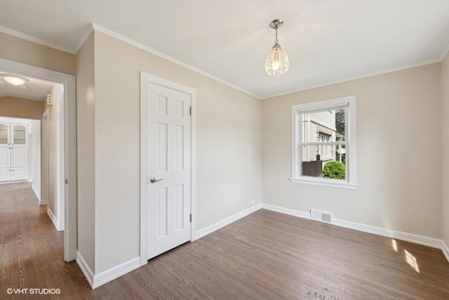108 Yost Ave, Park Ridge, IL 60068 - unfurnished bedroom featuring wood finished floors and crown molding